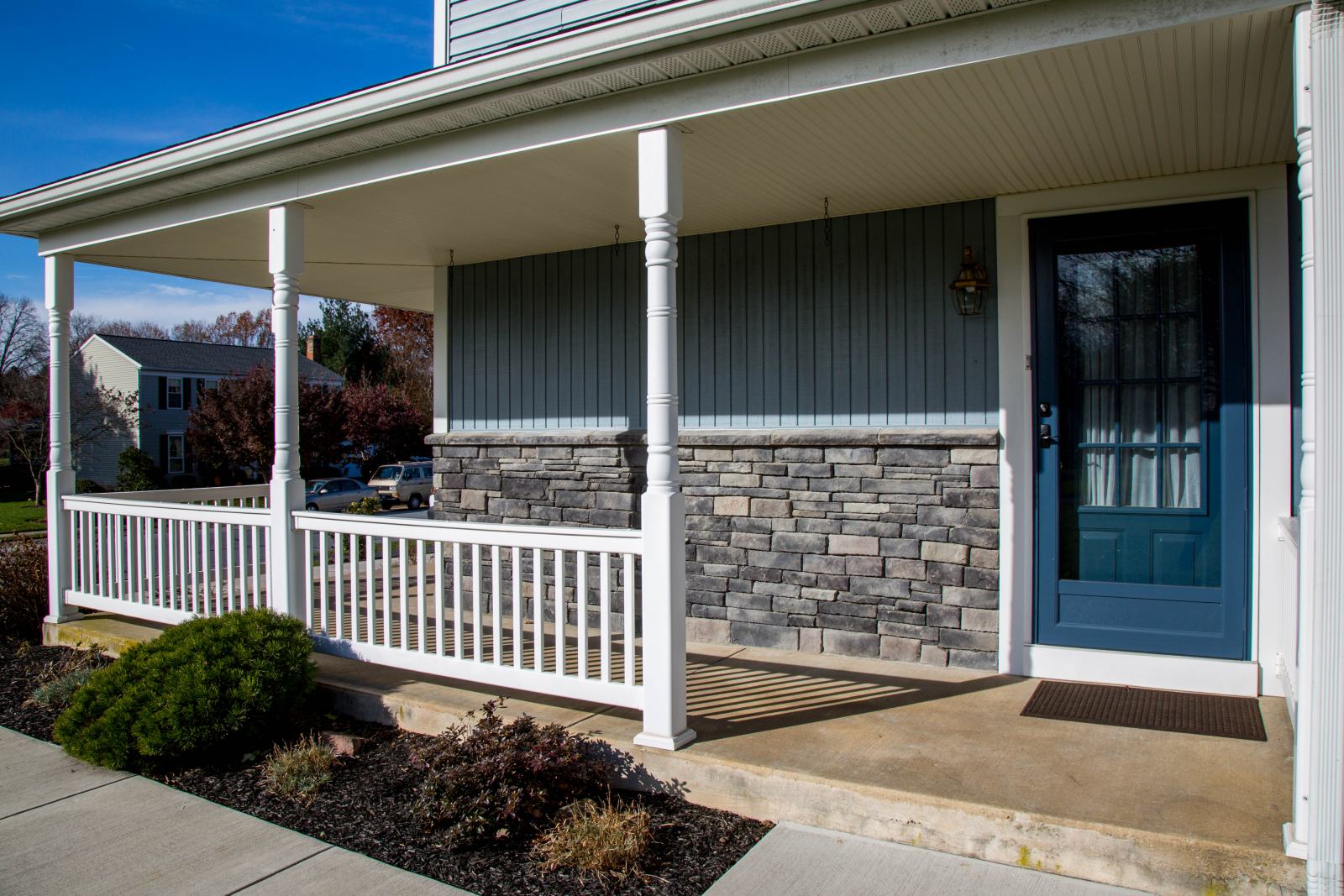 stone wall siding on front porch