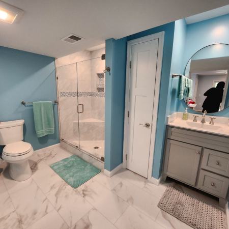 Thomas after - finished basement bathroom