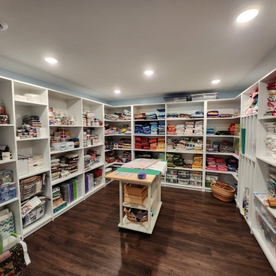 Thomas after - finished basement craft storage